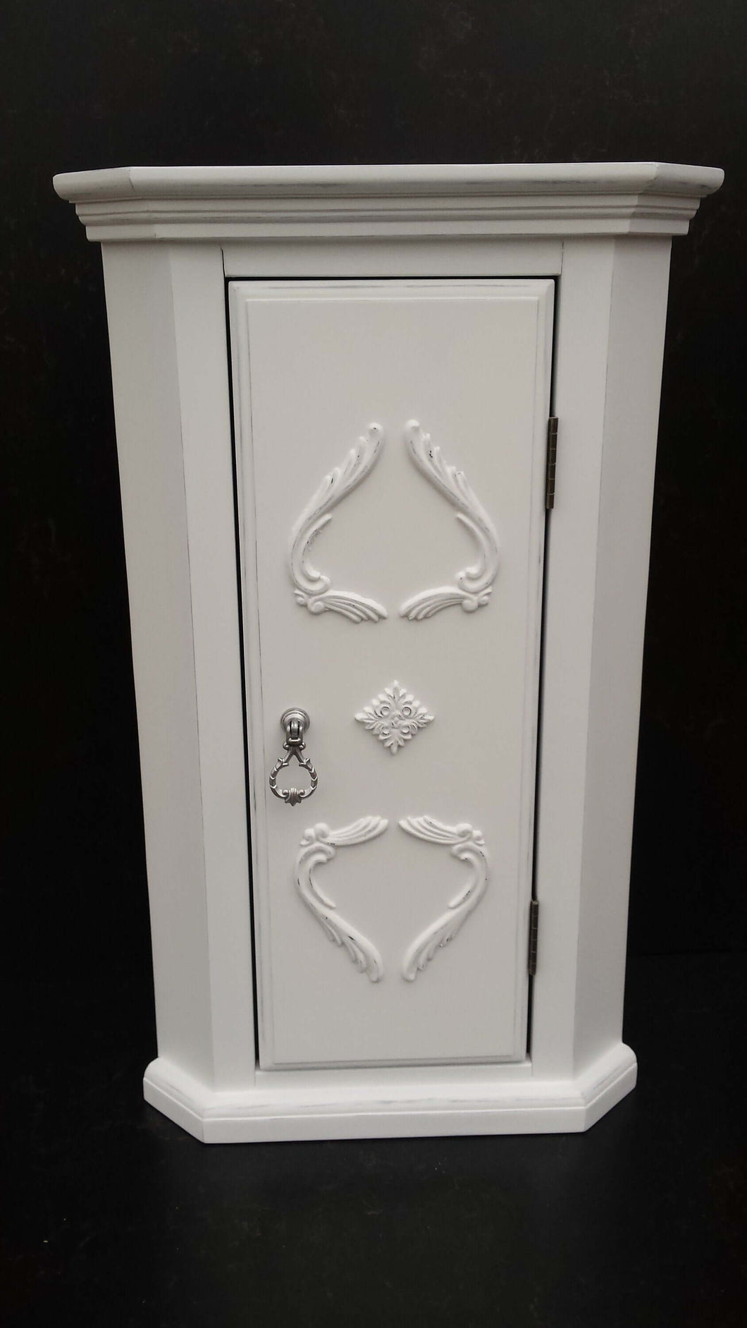 Jewelry corner cabinet