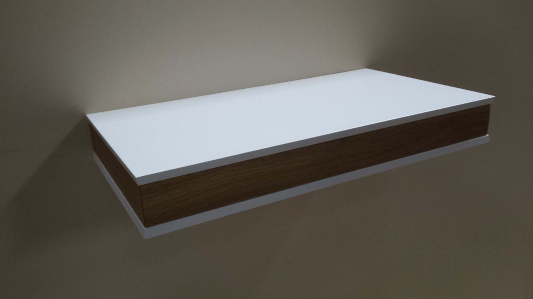 Floating shelf with hidden drawer and magnet lock